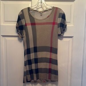 Burberry red Tee with iconic plaid cuffs.